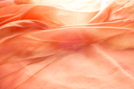 orange fabric texture. Tissue removed from the studio lightsの写真素材