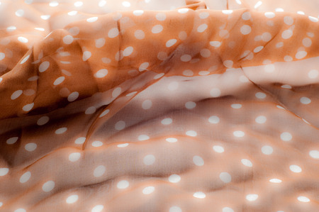 Fabric texture.   tissue, textile, cloth,  material, woven. Photos shot in studio. cloth, typically produced by weaving or knitting textile fibers.の写真素材