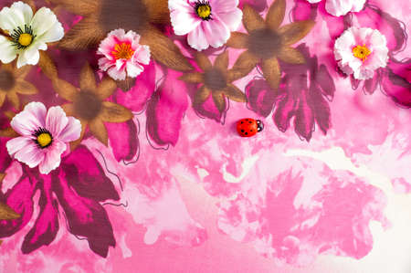 texture lace. a fine open fabric, typically one of cotton or silk, made by looping, twisting, or knitting thread in patterns and used especially for trimming garments.の写真素材