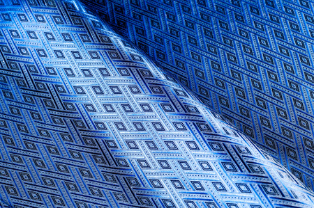 Fabric texture.   tissue, textile, cloth,  material, woven. Photos shot in studio. cloth, typically produced by weaving or knitting textile fibers.の写真素材
