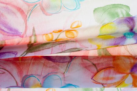 Fabric texture, red yellow blue dotted flowers Photo Made in studioの写真素材