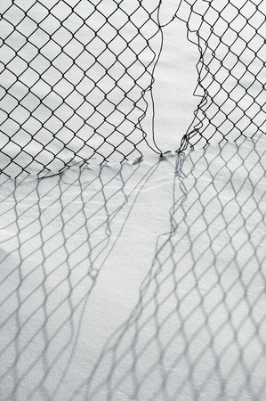 snow texture. atmospheric water vapor frozen into ice crystals and falling in light white flakes or lying on the ground as a white layerの写真素材