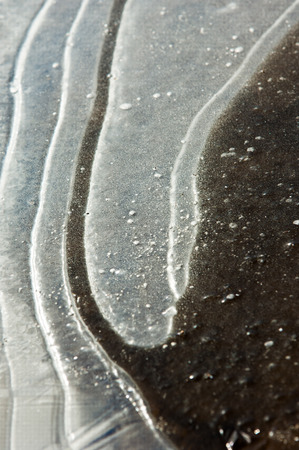 texture.  Frozen puddle, spring, ice patterns.の写真素材