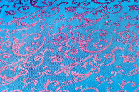 Fabric silk texture blue, flowers, abstract.