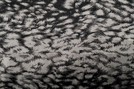 Fabric texture silk black. With gray spots. abstraction