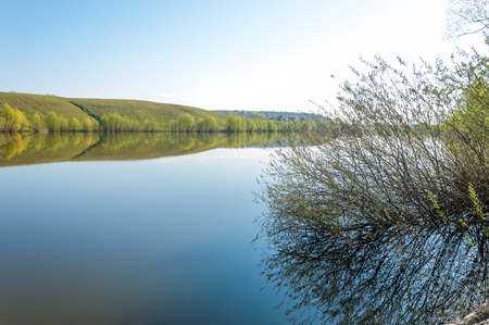 spring Lake. Pond spring. Lake in the spring park. spring lake scene. The shore of  lake in spring.の写真素材