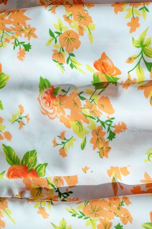 Cotton fabric texture flowers. fabric Baptiste. batiste, cambric, lawn. a fine, light linen or cotton fabric resembling cambric.の写真素材