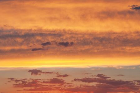 texture sunrise clouds. early morning. Sunrises sunsets, colorful sky, bright yellow cloudの写真素材