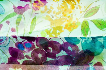 Fabric silk texture. abstract painting. bstract wave pattern on silk batik. a fine, strong, soft,...