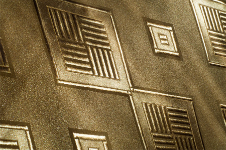 Beige silk fabric texture with diamond pattern. The background - the checked paperの写真素材