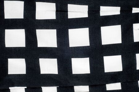 Batiste fabric texture. Checkered black and white diceの写真素材
