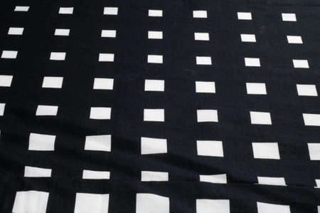 Batiste fabric texture. Checkered black and white diceの写真素材