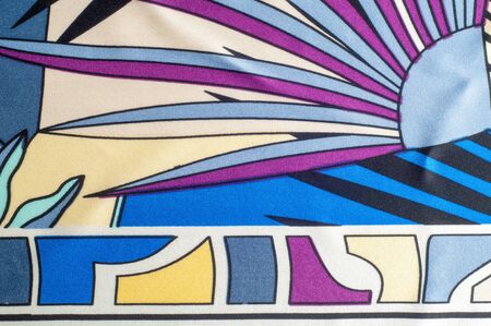 Texture of the silk fabric with a pattern of geometric shapes
