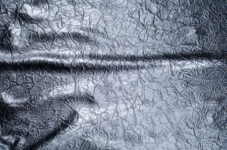 Fabric texture silk black. With gray spots. abstraction