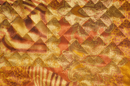 Fabric texture silk black.  abstraction. The texture of the fabric cloth quilted jackets