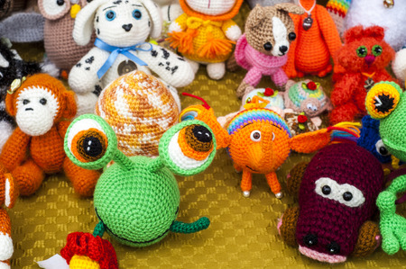 Handmade dolls, Toy company - many toys in. some coloured rag dolls, Cute handmade toys of glovesの写真素材