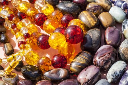 bead, chaplet, beading. a small piece of glass, stone, or similar material, typically rounded and...