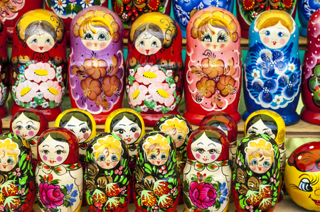 Colorful Russian nesting dolls at the market. These matryoshkas are a very popular souvenir among tourists. different in pattern and color matryoshkaの写真素材