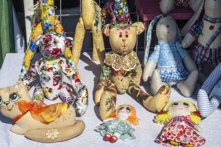 Handmade dolls, Toy company - many toys in. some coloured rag dolls, Cute handmade toys of glovesの写真素材