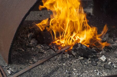 fire. combustion or burning, in which substances combine chemically with oxygen from the air and typically give out bright light, heat, and smoke.の写真素材