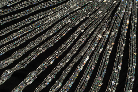 Fabric texture sequined.  jeweled, spangly, beady