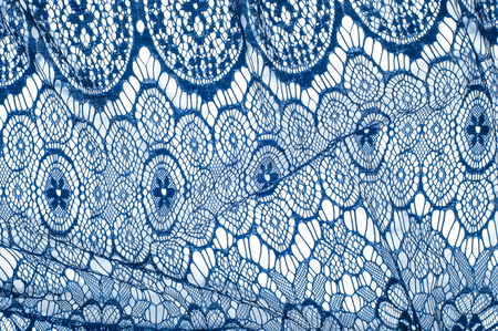 Texture lace fabric. lace on white background studio. thin fabric made of yarn or thread. typically...