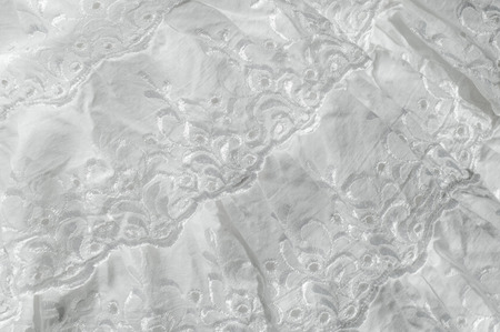 White cotton fabric, with patterns.  tissue, textile, cloth, material, textureの写真素材