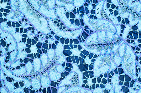 Texture lace fabric. lace on white background studio. thin fabric made of yarn or thread. typically...