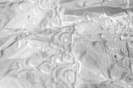 White cotton fabric, with patterns.  tissue, textile, cloth, material, textureの写真素材