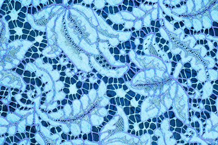 Texture lace fabric. lace on white background studio. thin fabric made of yarn or thread. typically...