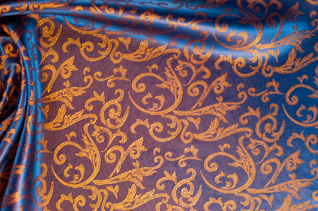 The texture of the silk fabric. Yellow Orange, Gold, Almond, Neon Carrot,  a fine, strong, soft,...