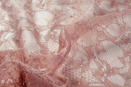 Lace on the fabric. tissue, textile, cloth, fabric, material, texture. of or relating to fabric or...