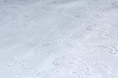 folds of white silk fabric, texture. Smooth elegant white silk can use as wedding background. The...