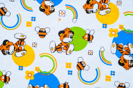 Texture, background. textiles. cotton cloth. children's drawings on fabricの写真素材