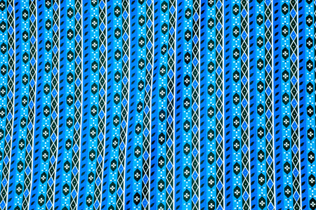 Texture, background. textiles. cotton cloth. bedding, curly blue stripe pattern on the fabric
