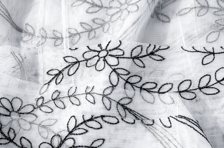 Texture, background. Tulle white with black stains of colorsの写真素材