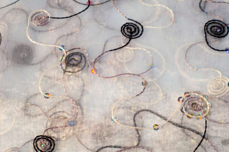 Texture, background. Tulle, organza. Beautiful patterns with butterflies