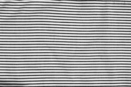 Texture, background. Fabric white with black stripes. cottonの写真素材