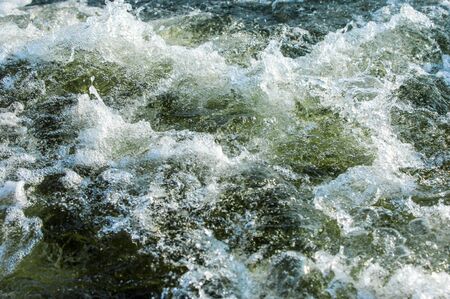 Texture, background. Water from a boat propeller