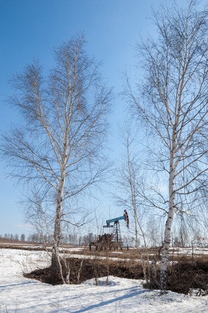 ecology, bionomics. Oil pumps. Oil industry equipment. Beam Pumping unit oil and gasの写真素材