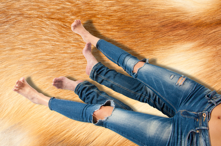 girl's legs. Photography studio. Beautiful fit long female legs,の写真素材