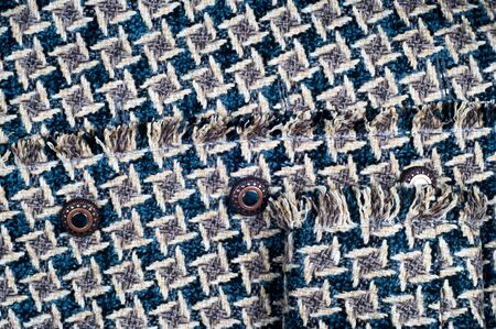 Texture, background. Female jacket in an abstract cell. Blue beige brownの写真素材