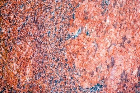 Texture, background. granite. a very hard, granular, crystalline, igneous rock consisting mainly of quartz, mica, and feldspar and often used as a building stone.の写真素材