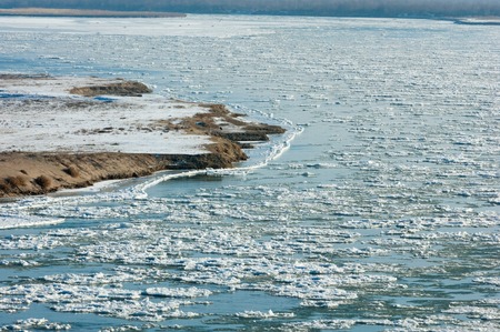 first frost formation of ice on the river. Ili Kazakhstan. Kapchagai Bakanas