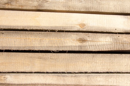 early spring, construction of wooden houses, the river ice.の写真素材