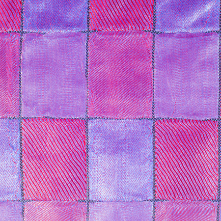 tissue, textile, cloth, fabric, material, texture. Textile red blue cell.  cloth, typically produced...