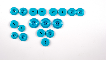 sewing buttons collection. Various sewing buttons with a thread. isolated.  collection of various sewing button on white background.の写真素材