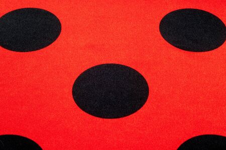 Fabric red polka dots, textile, cloth, fabric, material, texture. of or relating to fabric or weaving.の写真素材