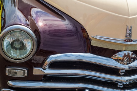 31.07 2015 Russia Tatarstan. Yelabuga, Spasskaya Fair. vintage car. Close up shot of a vintage car in sepia color toneのeditorial素材