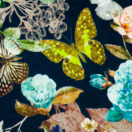 Knitted fabric. Flowers, berries and butterflies on a black background. texture. Photography Studioの写真素材